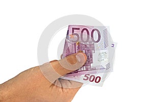 ManÃ¢â¬â¢s hand holding five hundred 500 Euro banknote money bill i